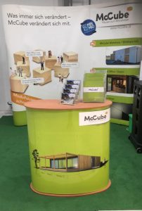 Messestand McCube Modulhäuser aus Holz